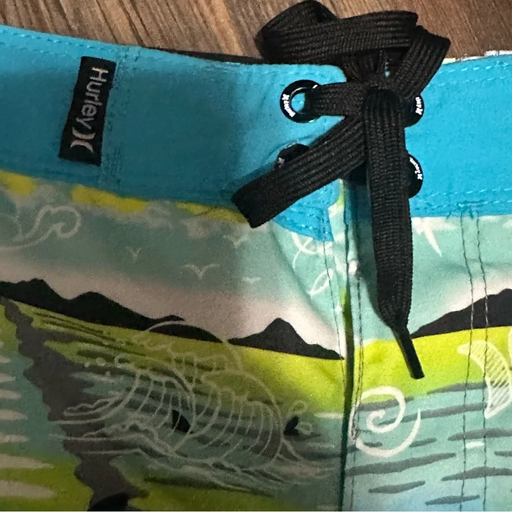 Hurley blue lazer tropical board shorts Swim trunks size 20 /30